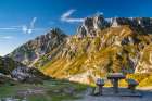 Slovenia, Triglav National Park. Picnic bench with view of Julian Alps. Art Print